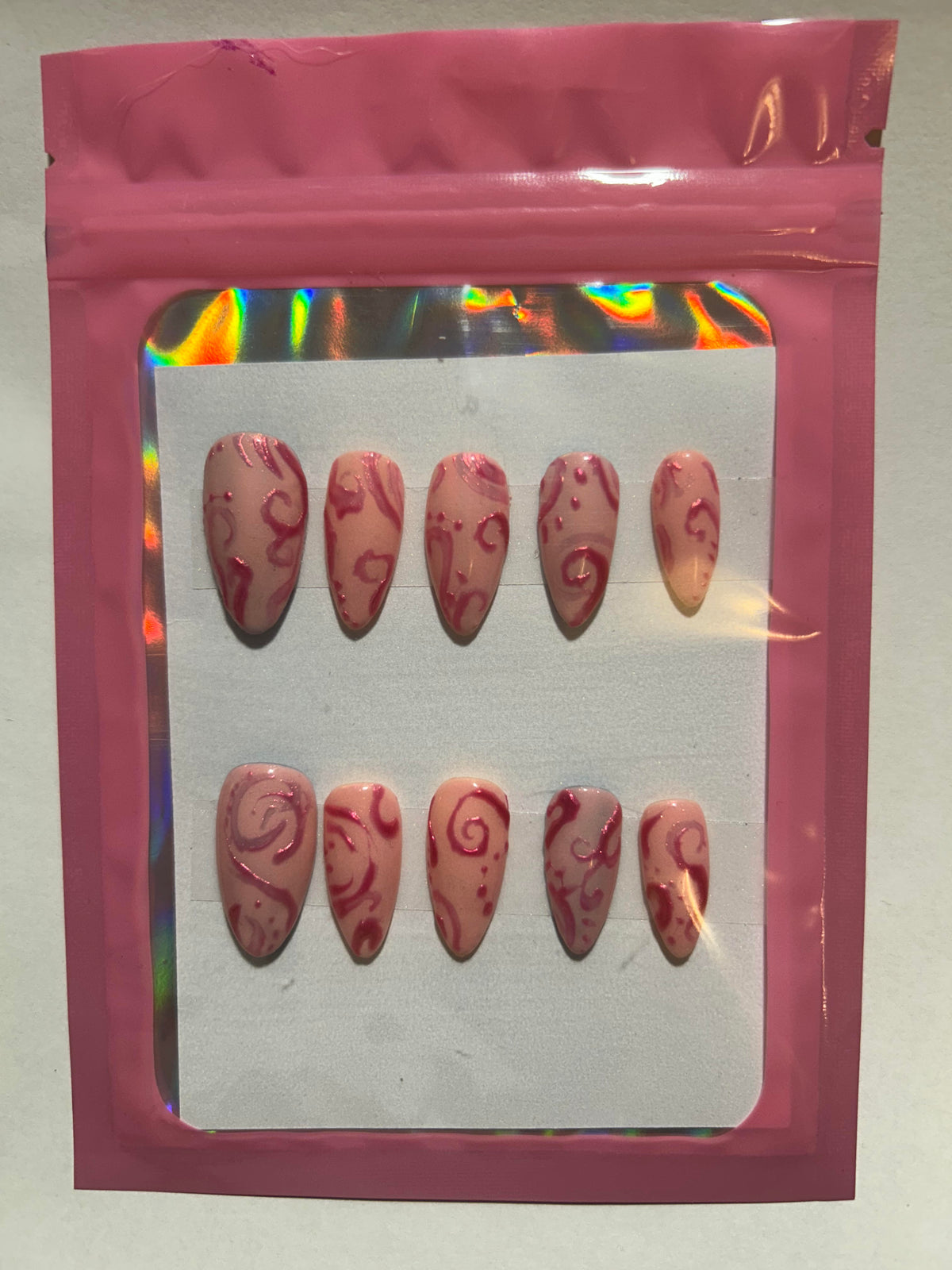 Pink Chrome Swirl Nails